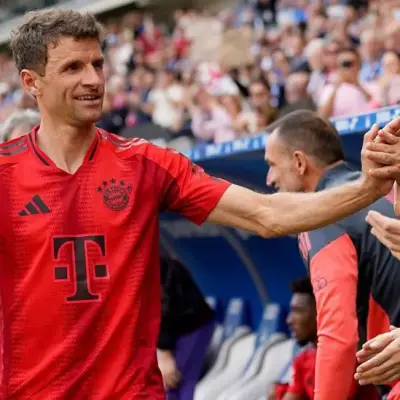 Muller says farewell as Bayern win on final day