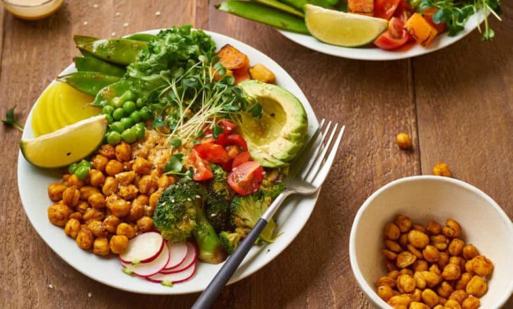 Veggie bowl with avocado, roasted chickpeas and crunchy greens
