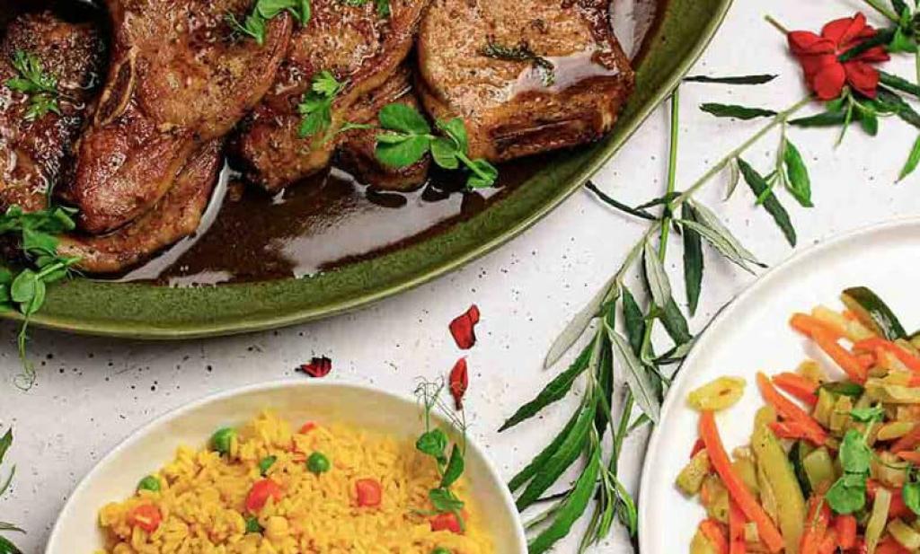 Glazed pork chops with stir-fry veggies and rice