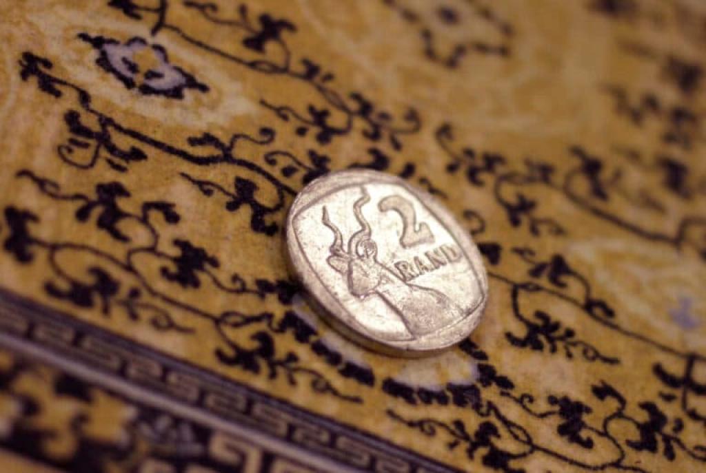 South African rand weakens as dollar firms