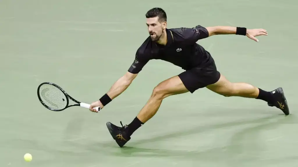 Novak Djokovic through to US Open second round following eventful match