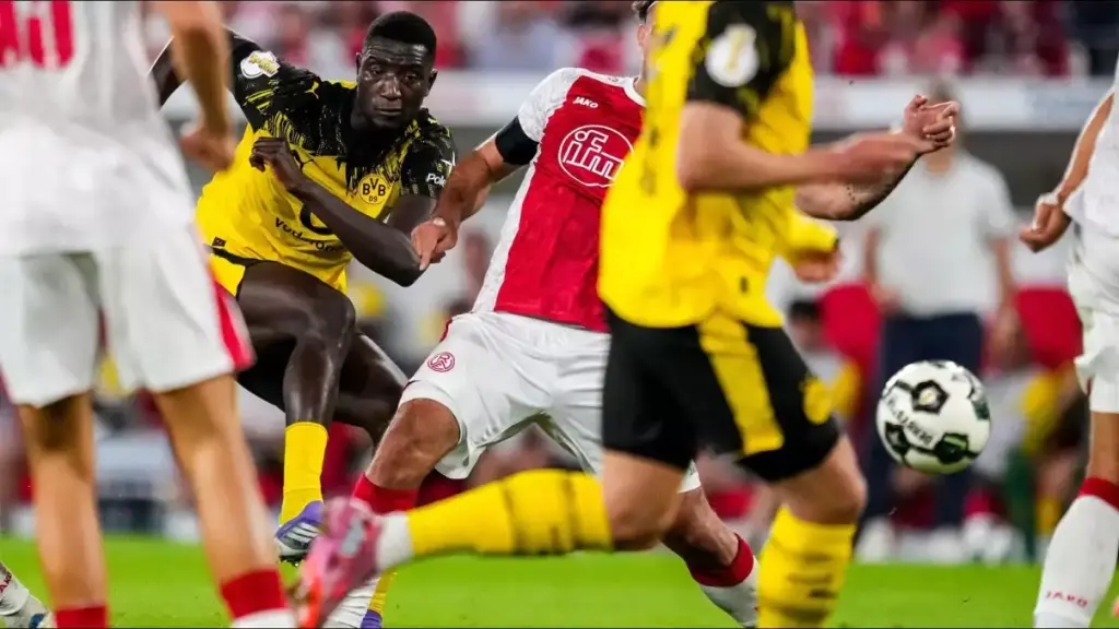 Serhou Guirassy's late strike sends Borussia Dortmund through in tense Pokal clash